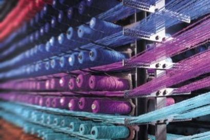 Pesatura e Controllo Qualit&agrave; Tessile: Il Ruolo delle Bilance